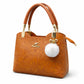 Black Floral Embossed Handbag with Pearl Charm